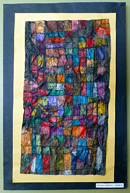 Abstract artwork with multi-colored squares and dark lines