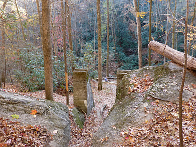 Mica mine ruins in the woods in autumn